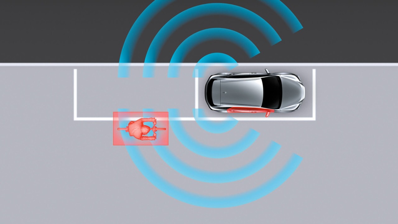 A person using the Safe Exit Assist in the Lexus RX