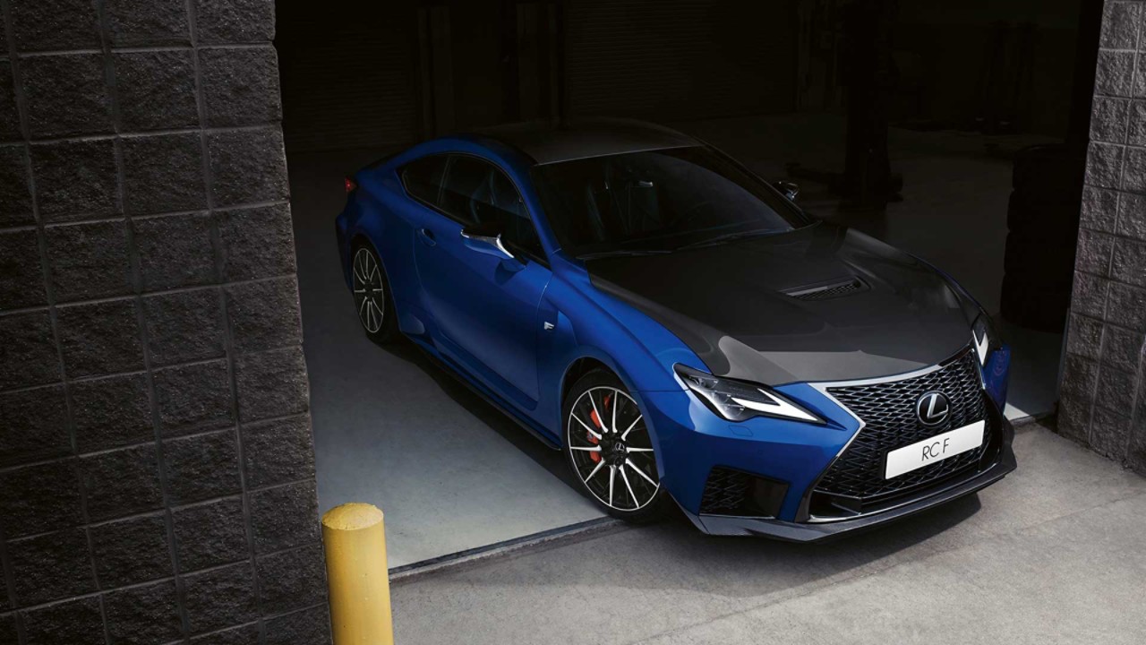 Lexus RC F Track Edition parked in a racing garage