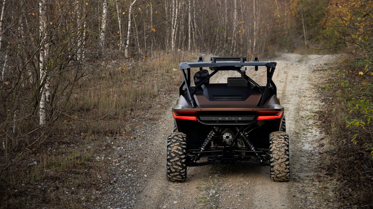 Rear view of the Lexus ROV Concept car driving on an off-road track